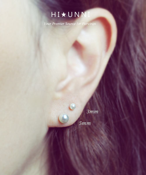 pearl earrings on ear